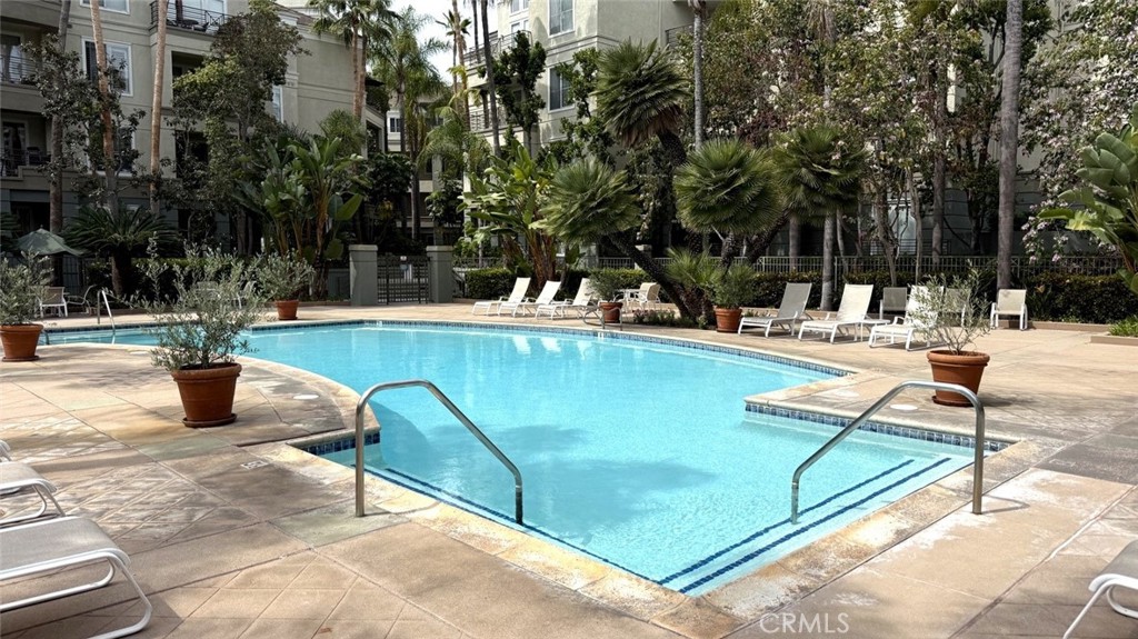2253 Martin, Unit 107 Irvine, CA 92612 - Photo 17 of 17 a view of a swimming pool with a patio