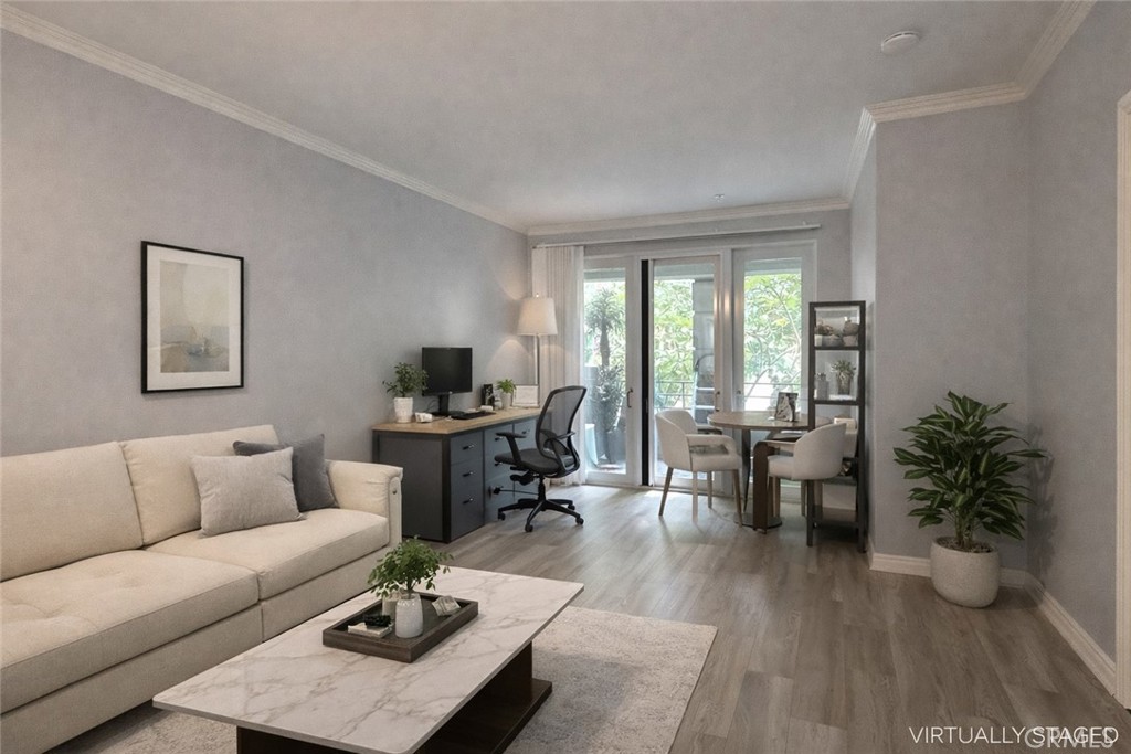 2253 Martin, Unit 107 Irvine, CA 92612 - Photo 5 of 17 a living room with furniture potted plant wooden floor and a window