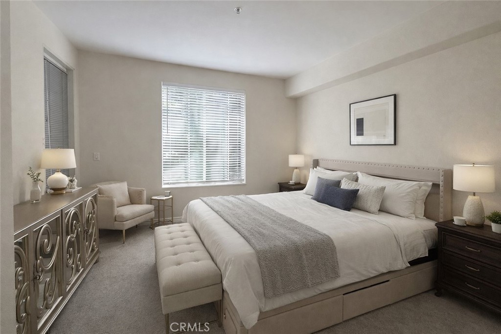 2253 Martin, Unit 107 Irvine, CA 92612 - Photo 8 of 17 a bedroom with a bed and wooden floor