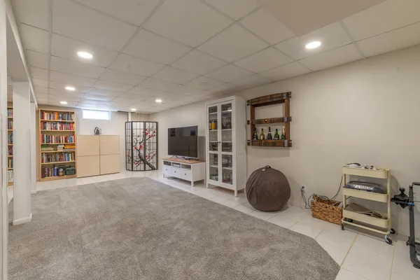 a room with furniture and a flat screen tv
