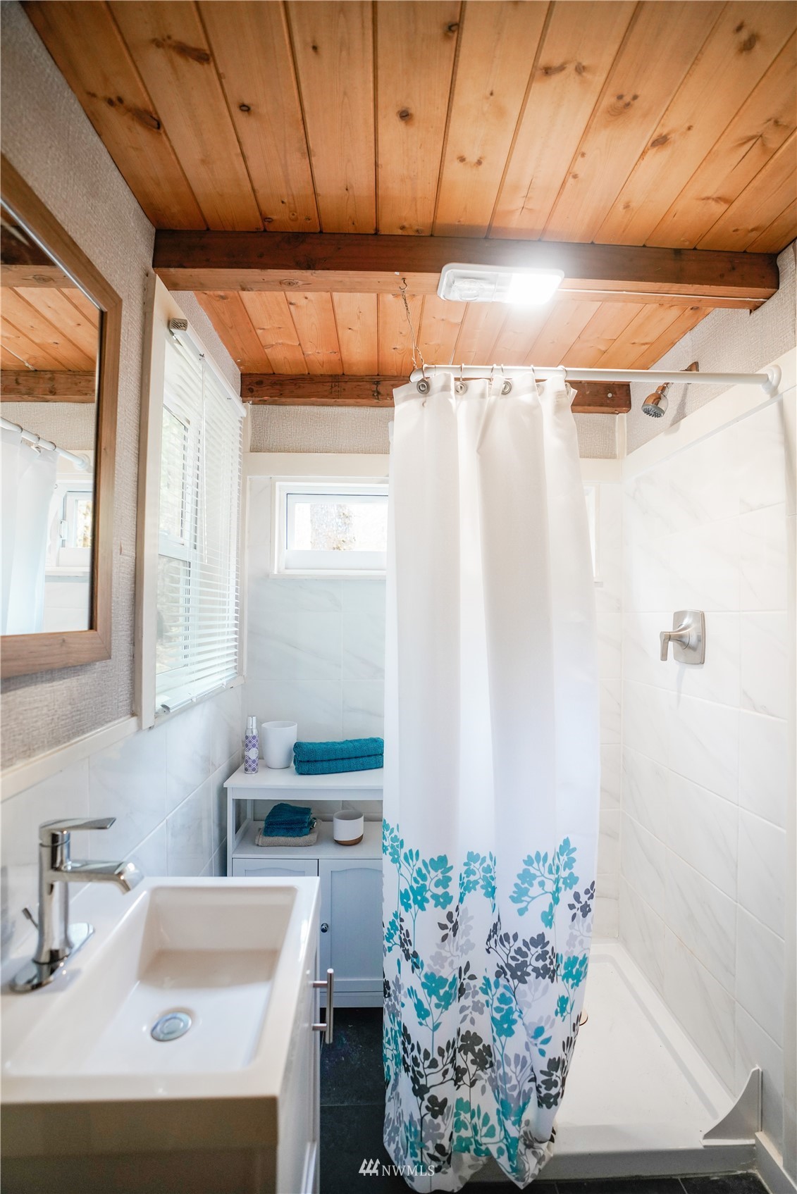16128 Index-Galena Road Index, WA 98256 - Photo 15 of 35 a bathroom with a sink and a mirror