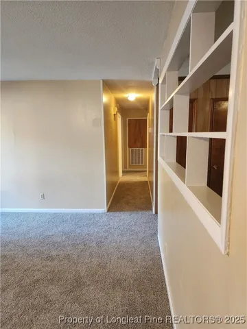 a bathroom with a sink toilet and mirror