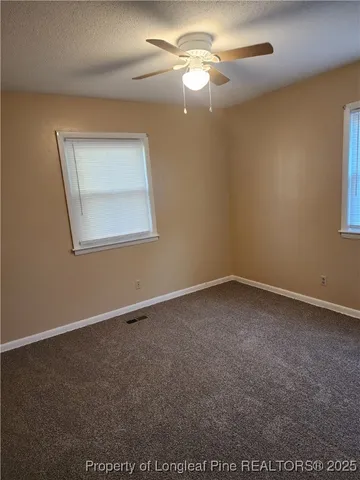 a bathroom with a toilet sink and shower