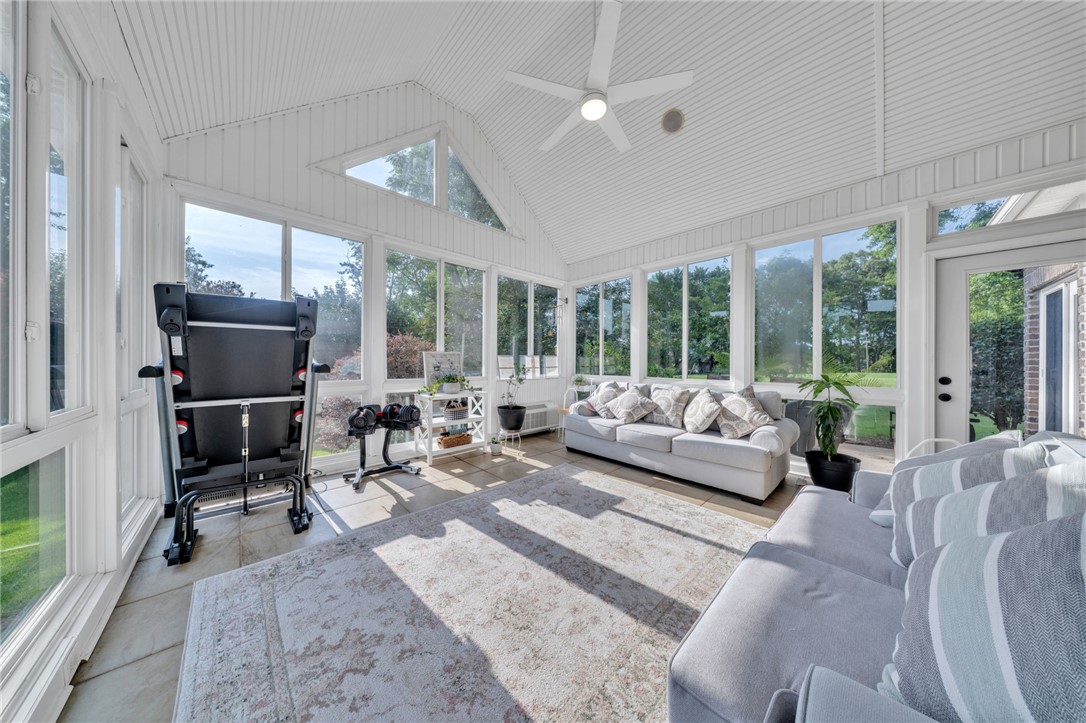 102 Country Walk Lane Clemson, SC 29631 - Photo 21 of 39 A tranquil sunroom beckons with panoramic views and a vaulted ceiling.