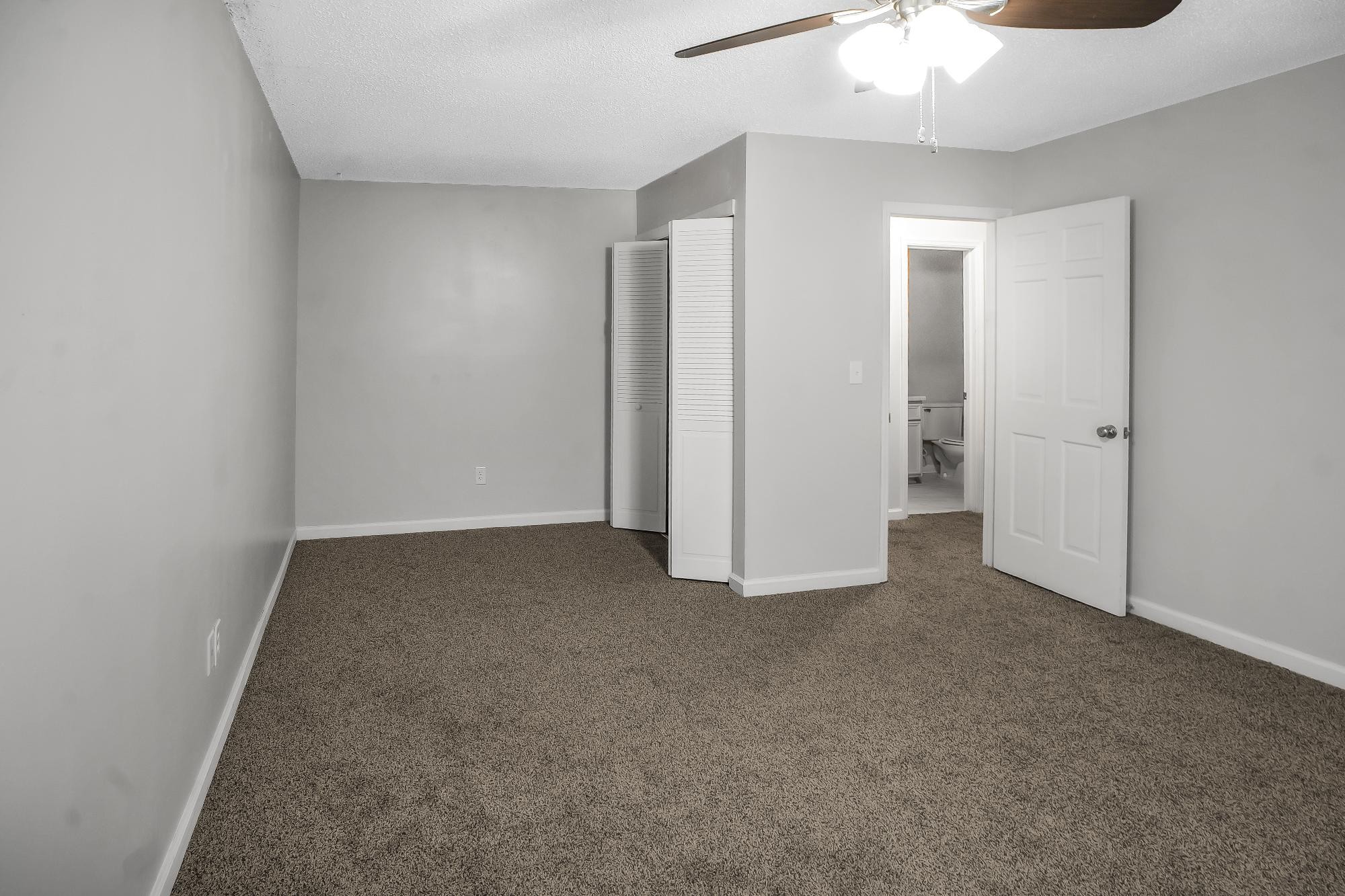 1301 Neelys Bend Road, Unit 73 Madison, TN 37115 - Photo 11 of 17 an empty room with a chandelier fan
