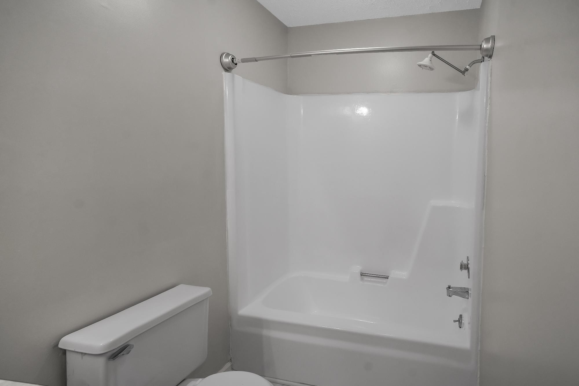 1301 Neelys Bend Road, Unit 73 Madison, TN 37115 - Photo 16 of 17 a bathroom with a shower and a toilet