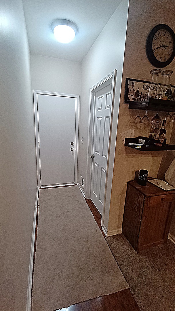 17543 Gilbert Drive Lockport, IL 60441 - Photo 20 of 54 a view of an entryway with wooden floor