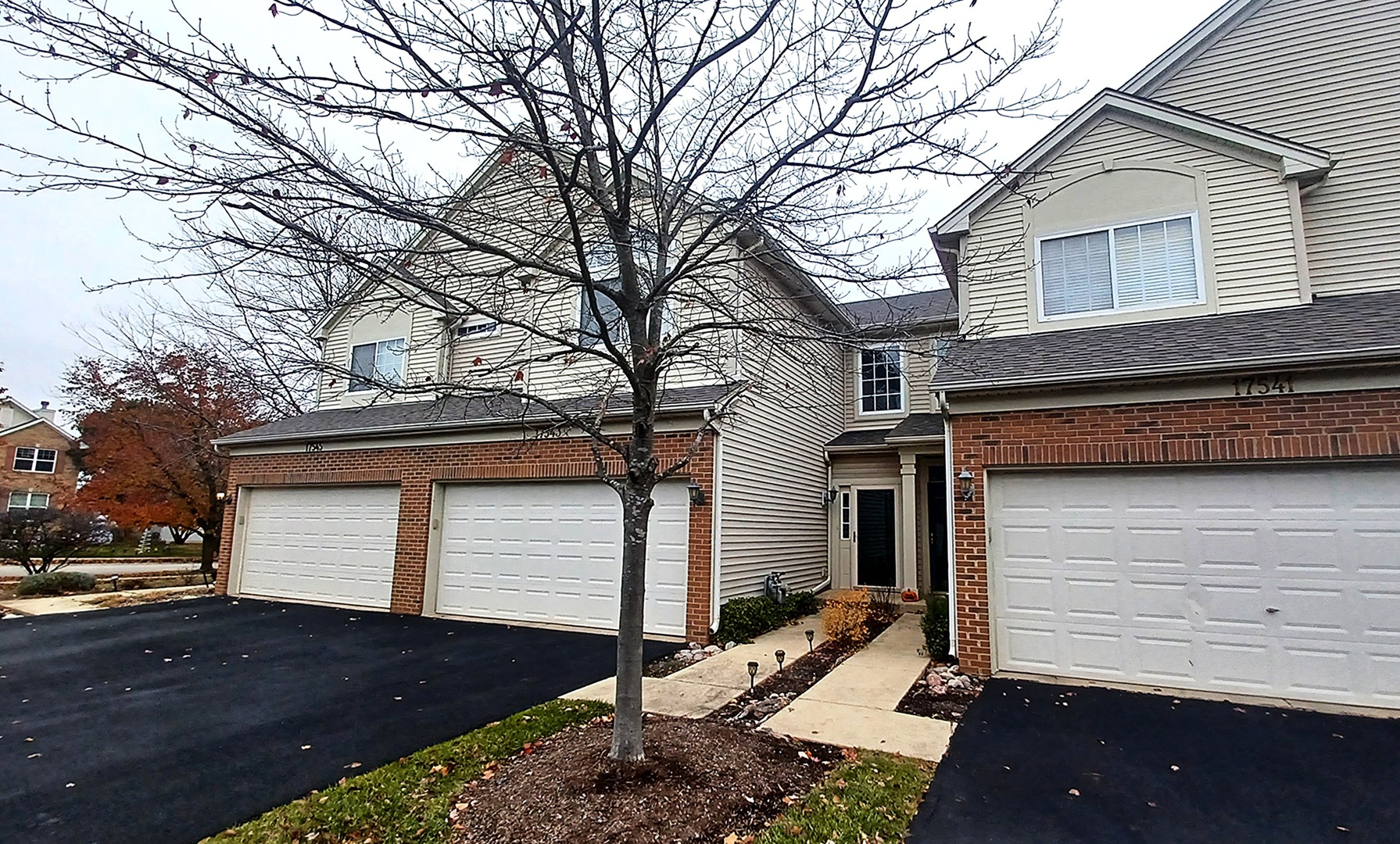 17543 Gilbert Drive Lockport, IL 60441 - Photo 2 of 54 a front view of house with a yard