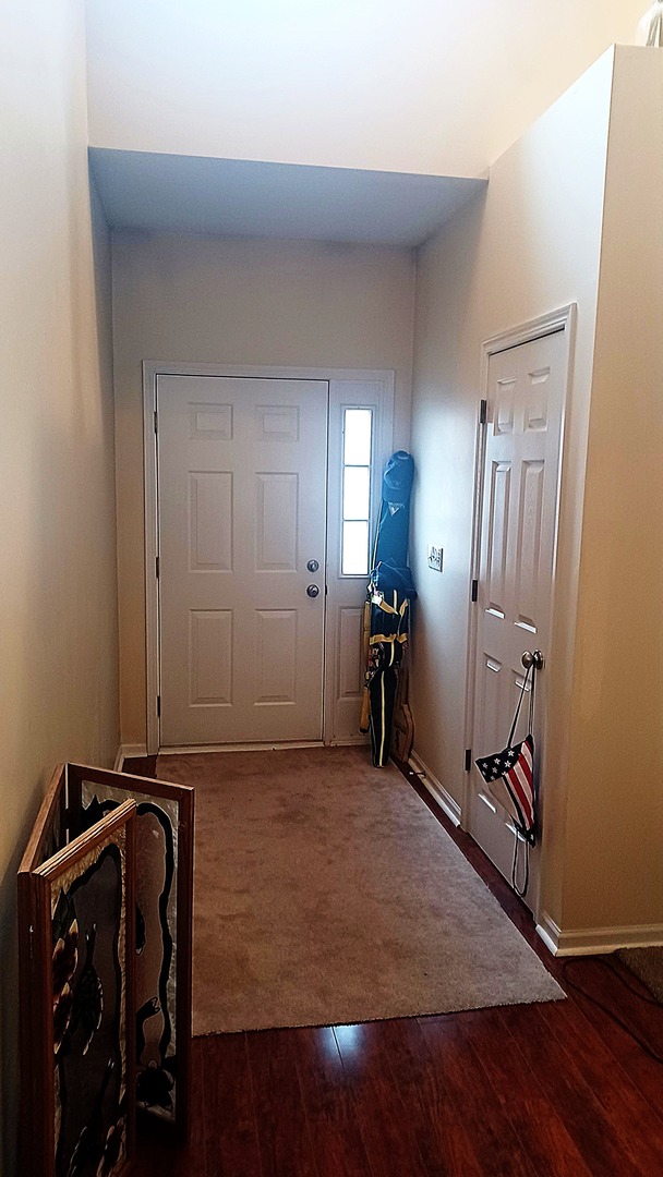 17543 Gilbert Drive Lockport, IL 60441 - Photo 5 of 54 a view of a livingroom with furniture and wooden floor