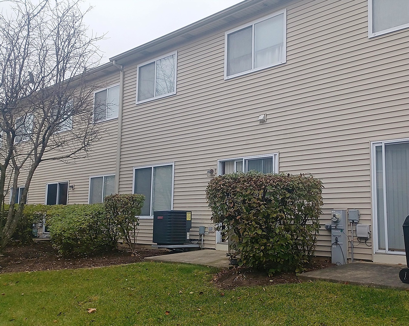 17543 Gilbert Drive Lockport, IL 60441 - Photo 52 of 54 a view of a house with a yard and plants