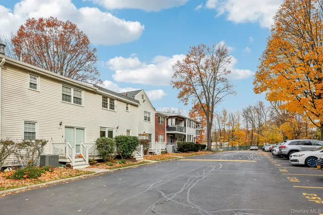 a view of a street with cars