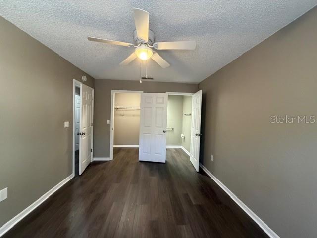 4400 Millwood Road, Unit E Spring Hill, FL 34608 - Photo 19 of 21 wooden floor in an empty room with a window