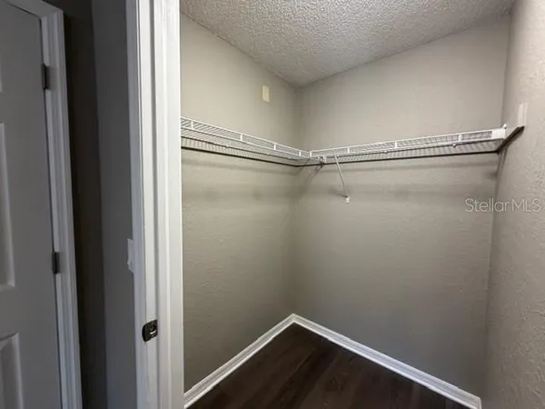 a view of a room with racks on the wall