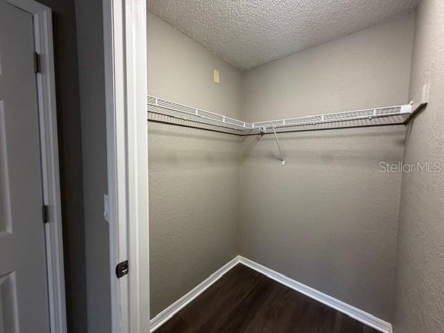4400 Millwood Road, Unit E Spring Hill, FL 34608 - Photo 21 of 21 a view of a room with racks on the wall