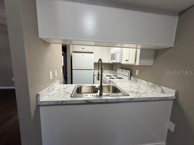 4400 Millwood Road, Unit E Spring Hill, FL 34608 - Photo 9 of 21 a close view of sink and tap