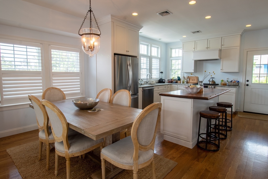 117 River Street Scituate, MA 02050 - Photo 4 of 23 a view of a dining room with furniture window and wooden floor