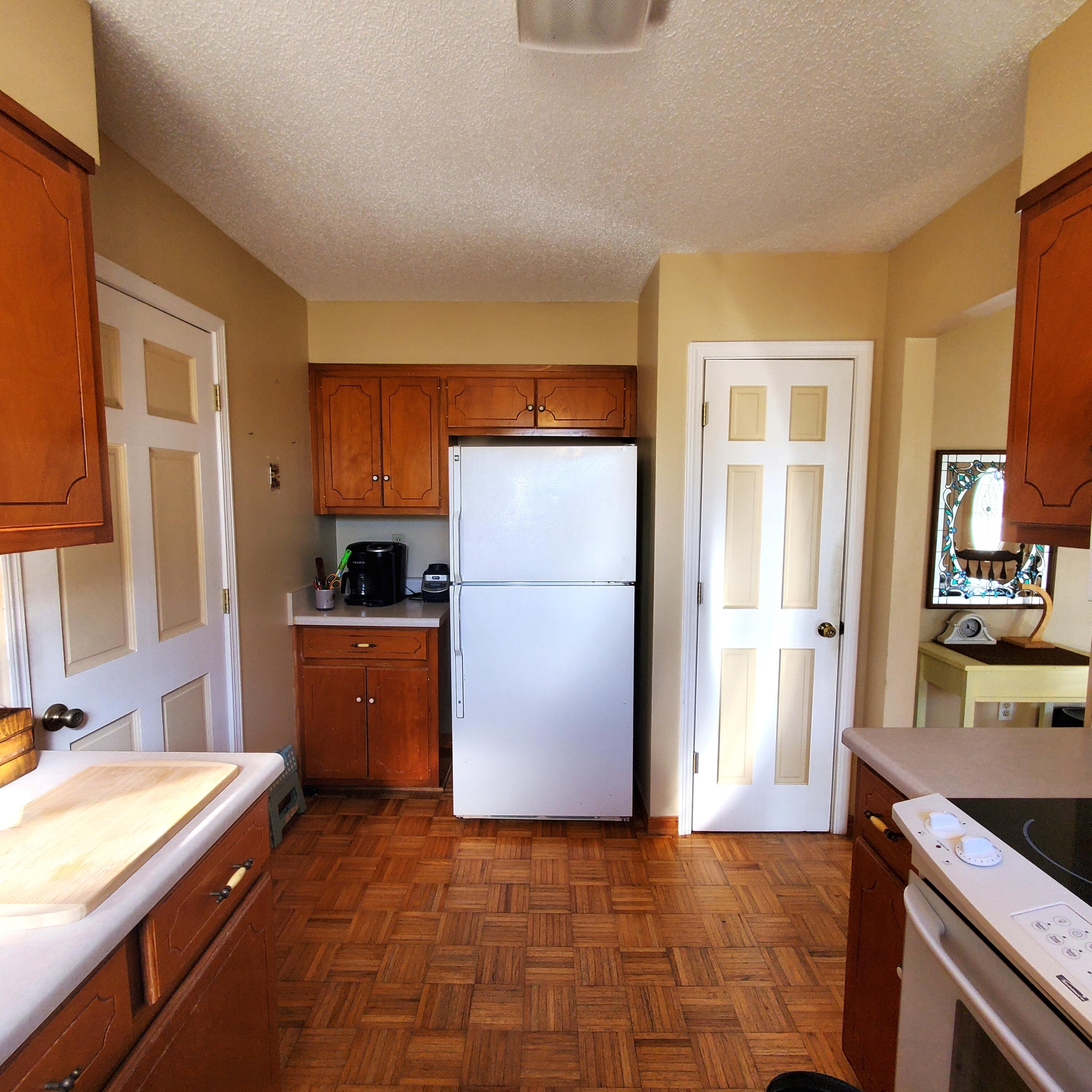 6060 Old Bethel Road Crestview, FL 32536 - Photo 11 of 25 a kitchen with a refrigerator and a sink