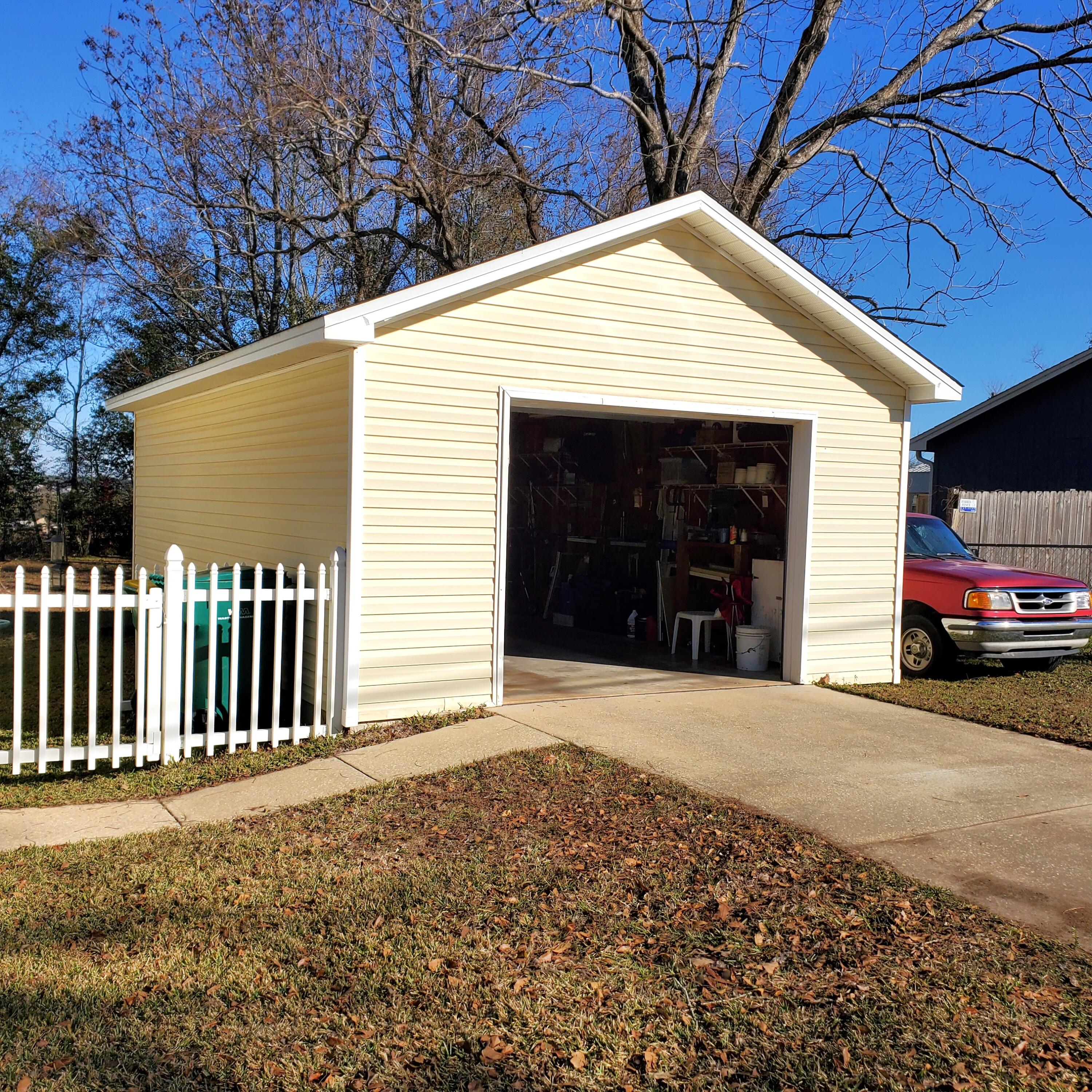 6060 Old Bethel Road Crestview, FL 32536 - Photo 21 of 25 a front view of a house with a garage