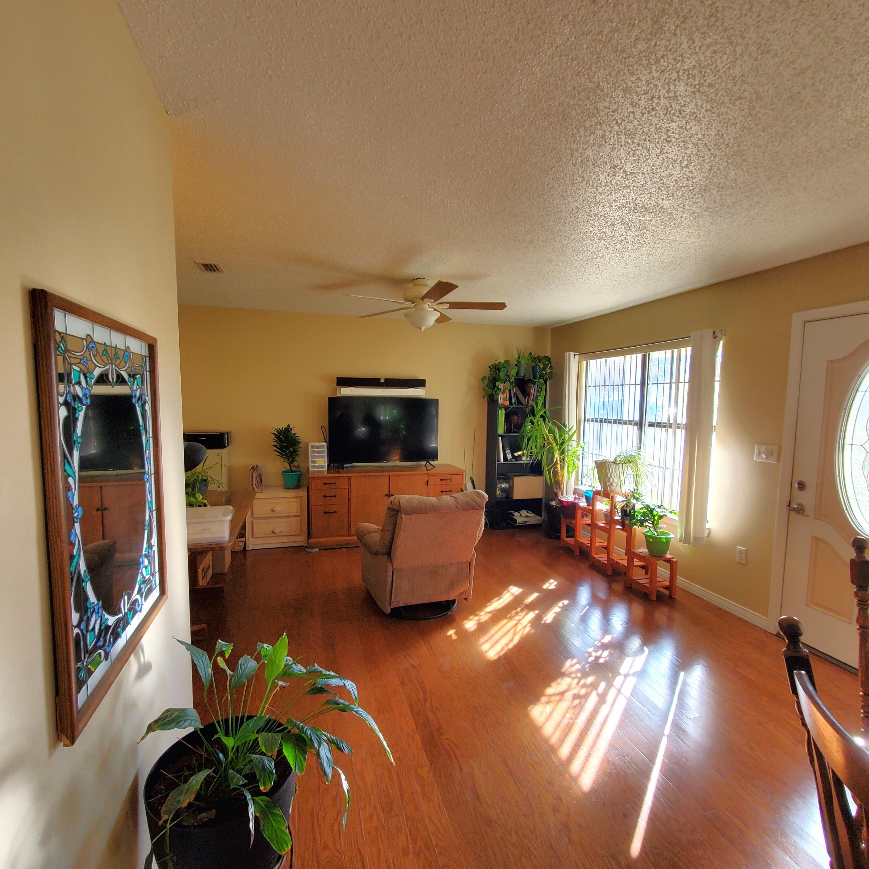 6060 Old Bethel Road Crestview, FL 32536 - Photo 5 of 25 a living room with furniture and a flat screen tv