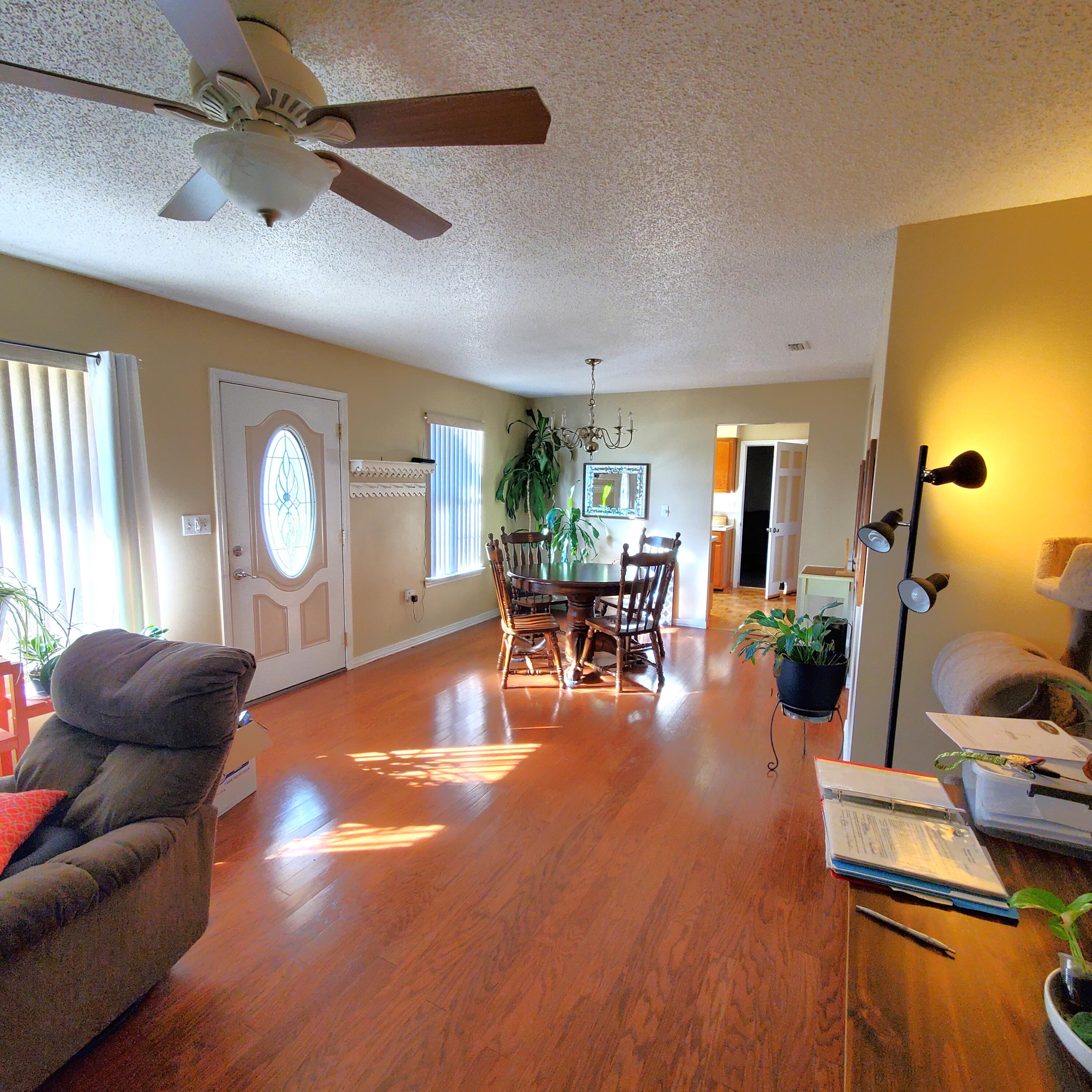 6060 Old Bethel Road Crestview, FL 32536 - Photo 7 of 25 a living room with furniture and wooden floor