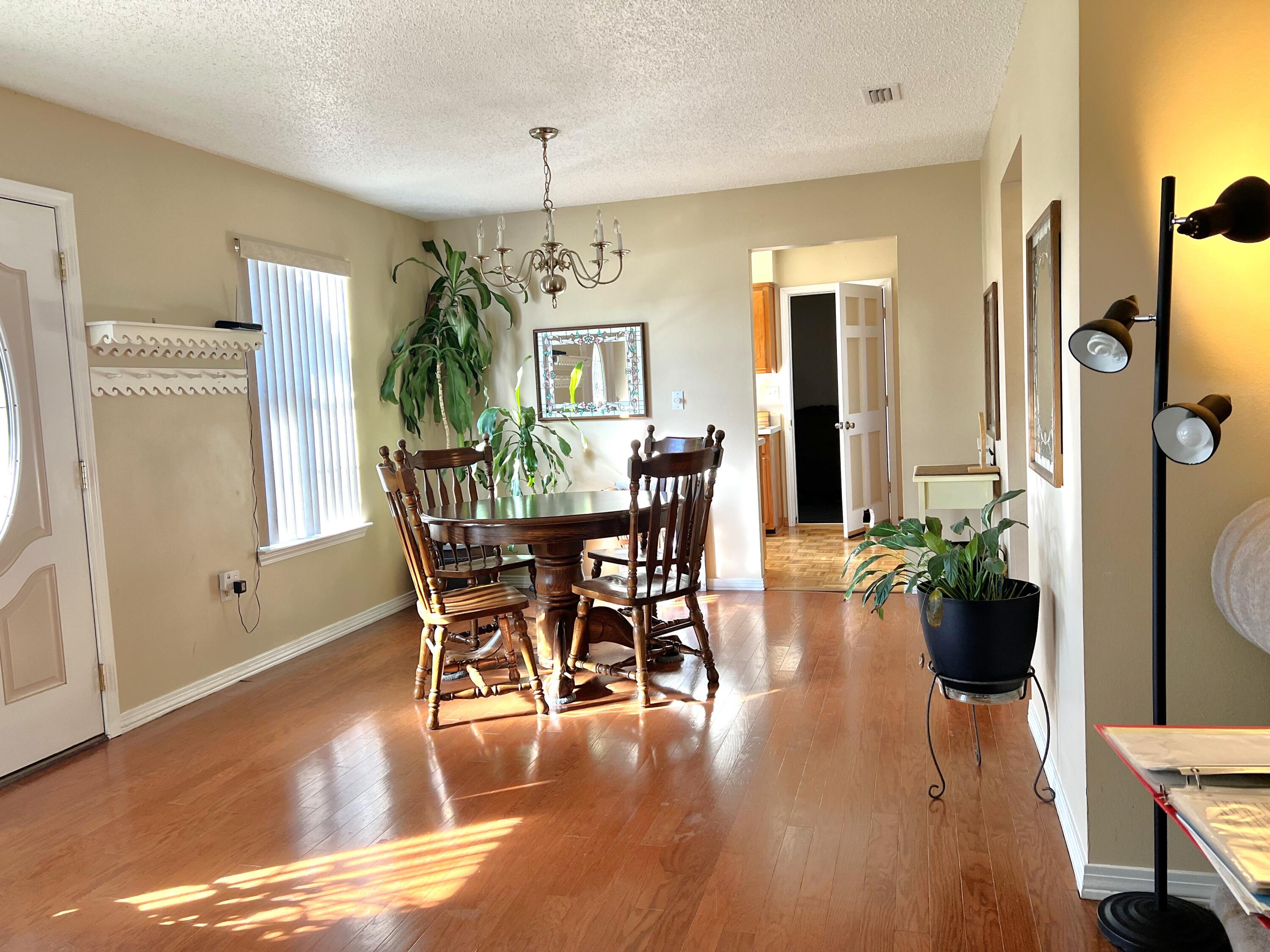 6060 Old Bethel Road Crestview, FL 32536 - Photo 9 of 25 a view of a dining room with furniture window and wooden floor