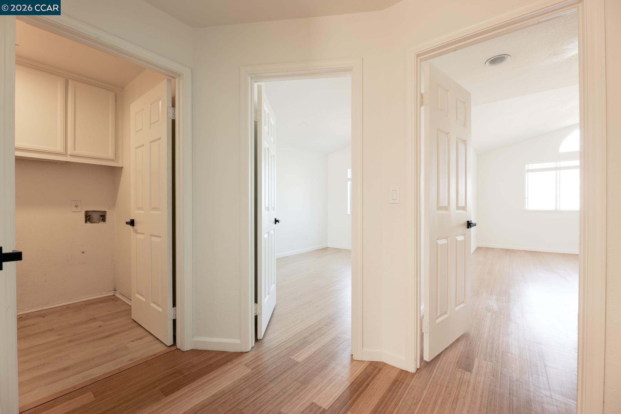 528 Dohrmann Lane Pinole, CA 94564 - Photo 18 of 27 a view of a hallway with wooden floor
