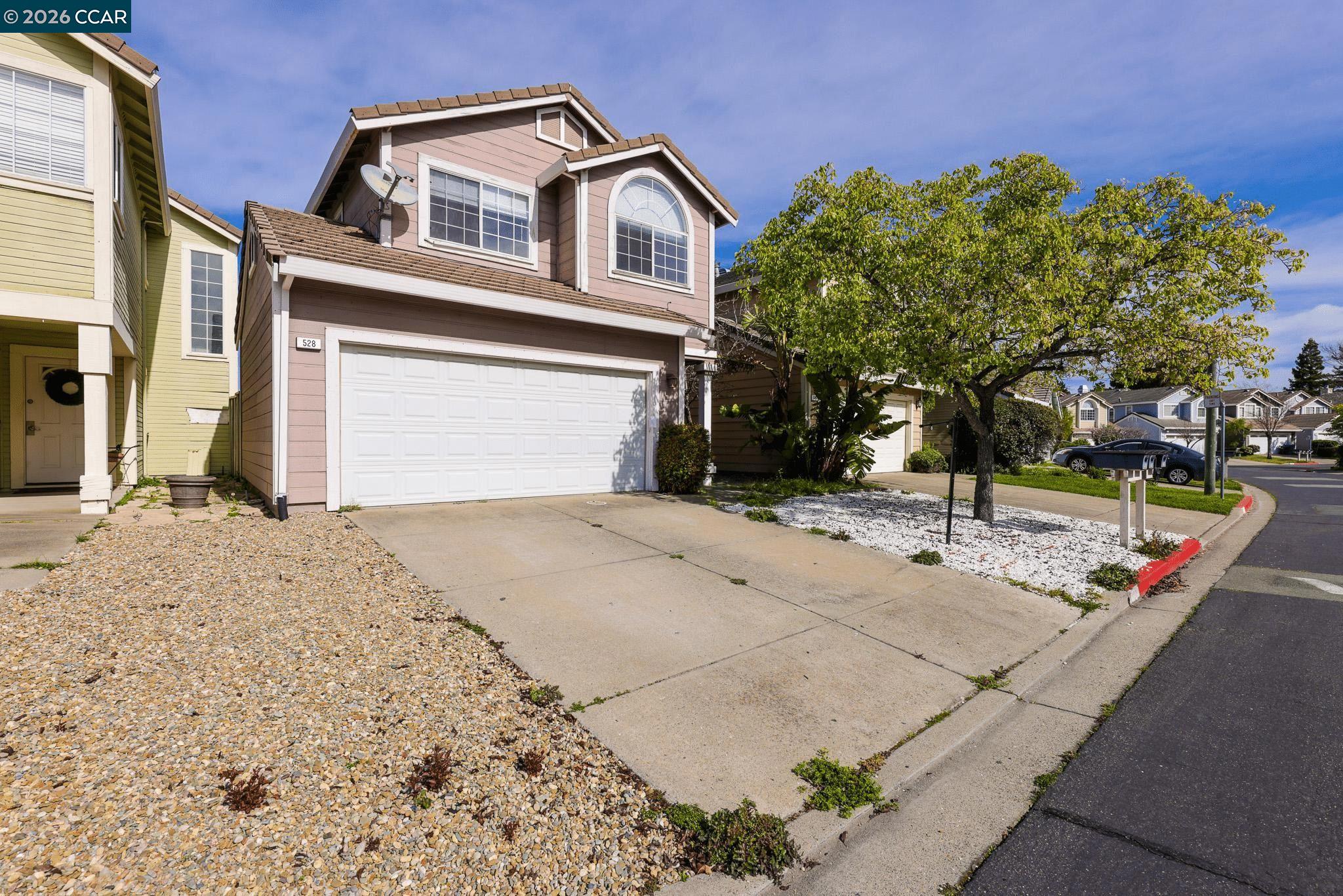 528 Dohrmann Lane Pinole, CA 94564 - Photo 2 of 27 a view of a house with a snow on the road
