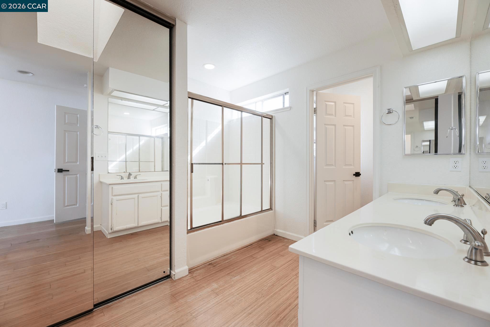 528 Dohrmann Lane Pinole, CA 94564 - Photo 24 of 27 a bathroom with a sink and mirror