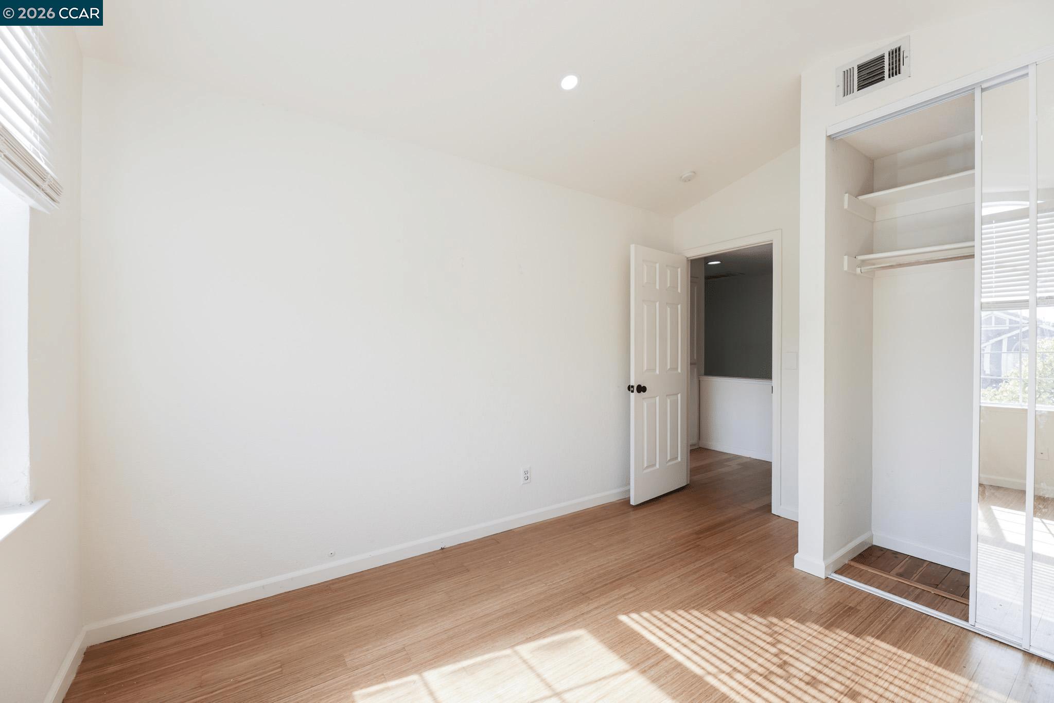 528 Dohrmann Lane Pinole, CA 94564 - Photo 25 of 27 a view of a room with wooden floor and a bathroom