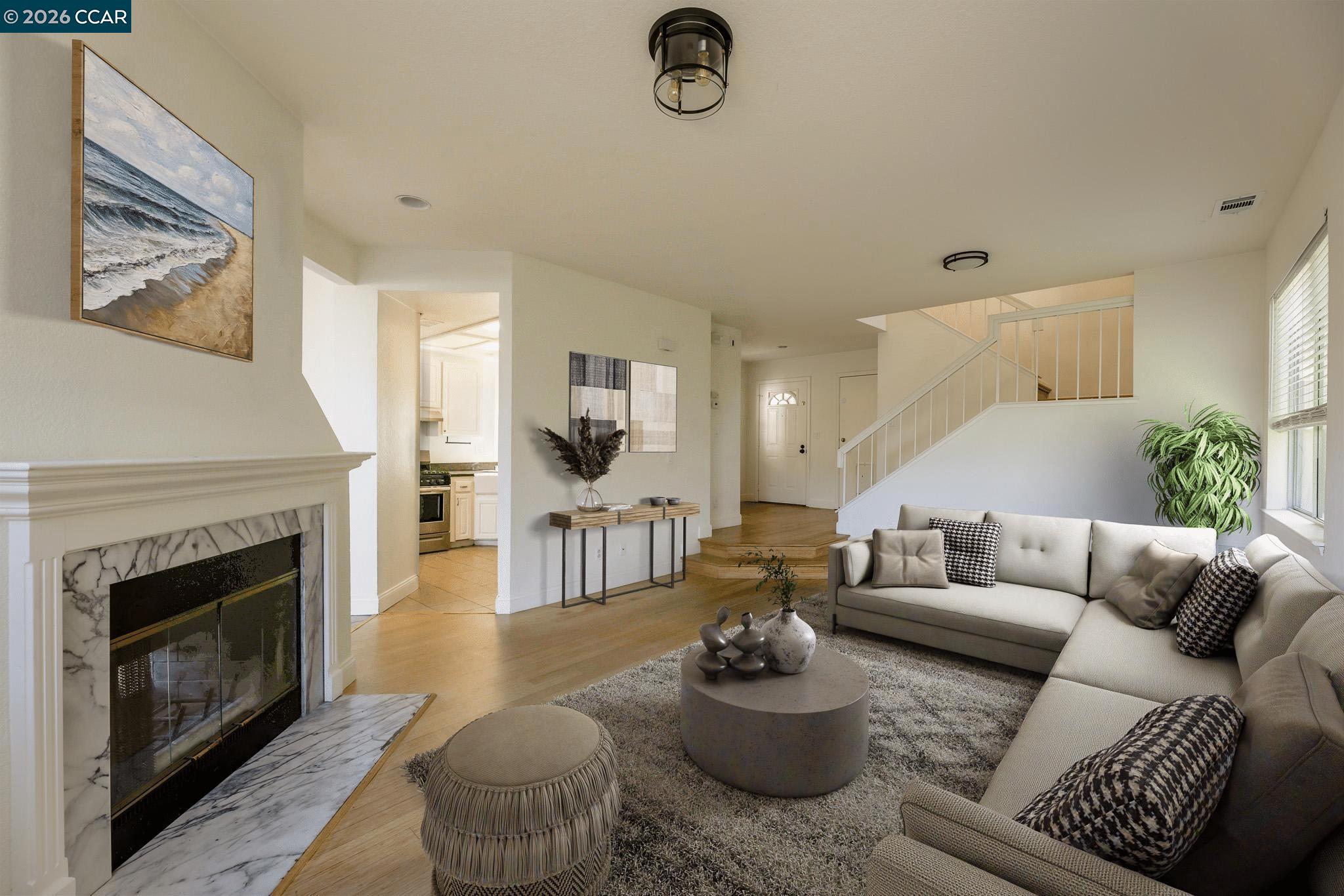 528 Dohrmann Lane Pinole, CA 94564 - Photo 5 of 27 a living room with furniture and a fireplace