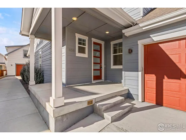 a front view of house with stairs