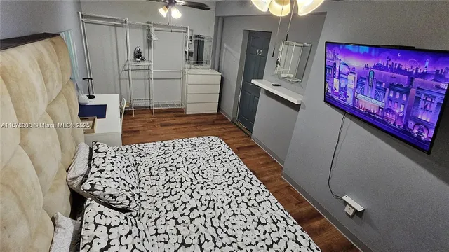 a bathroom with a bathtub and shower