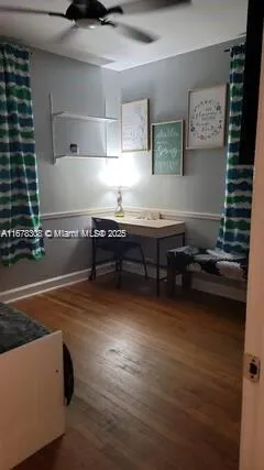 a kitchen with wooden cabinets and a stove