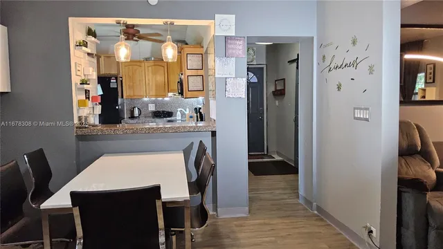 a view of a dining room with furniture