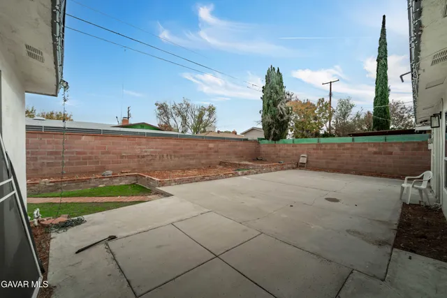 a view of backyard with outdoor space