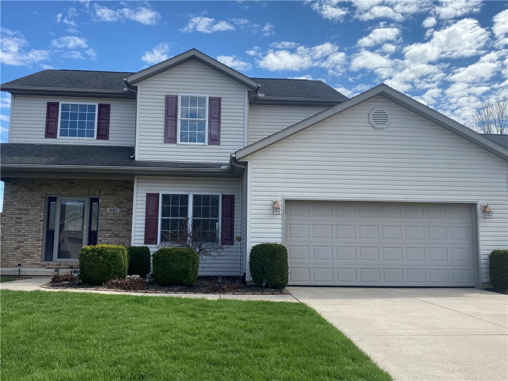 541 North Point Troy, OH 45373 - Photo 1 of 23 This two-story home features a spacious garage and a well-maintained lawn.