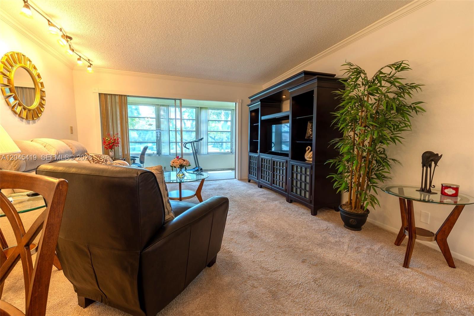 8814 West McNab Road, Unit 204 Tamarac, FL 33321 - Photo 6 of 23 Living Room