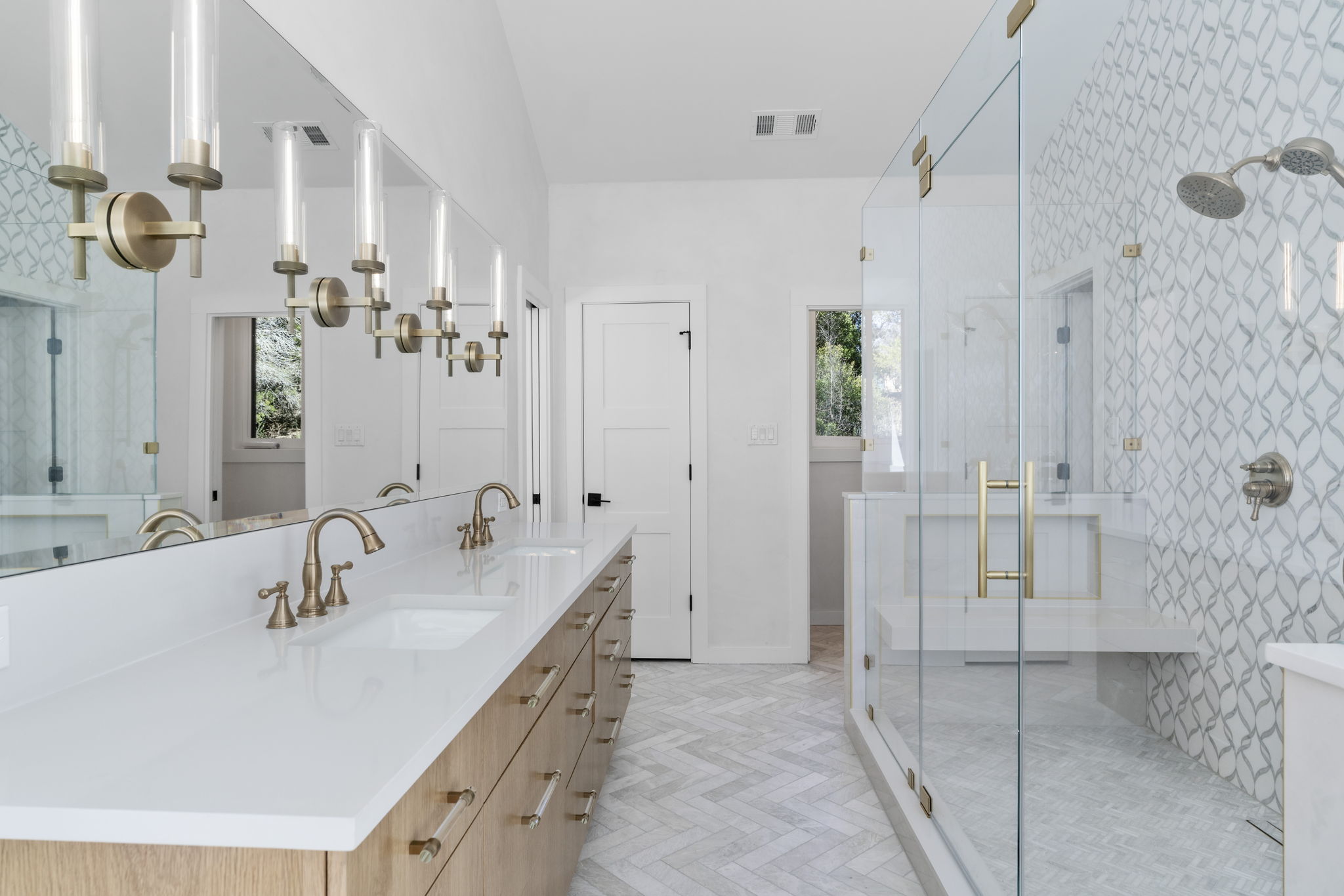 701 Furlong Drive Austin, TX 78746 - Photo 20 of 40 a bathroom with a double vanity sink mirror and shower