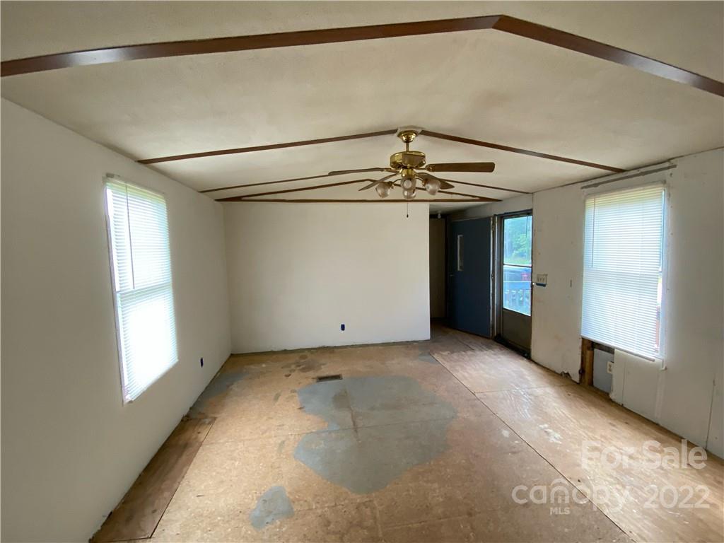 1454 Rhyne Road Clover, SC 29710 - Photo 5 of 8 an empty room with windows and fan