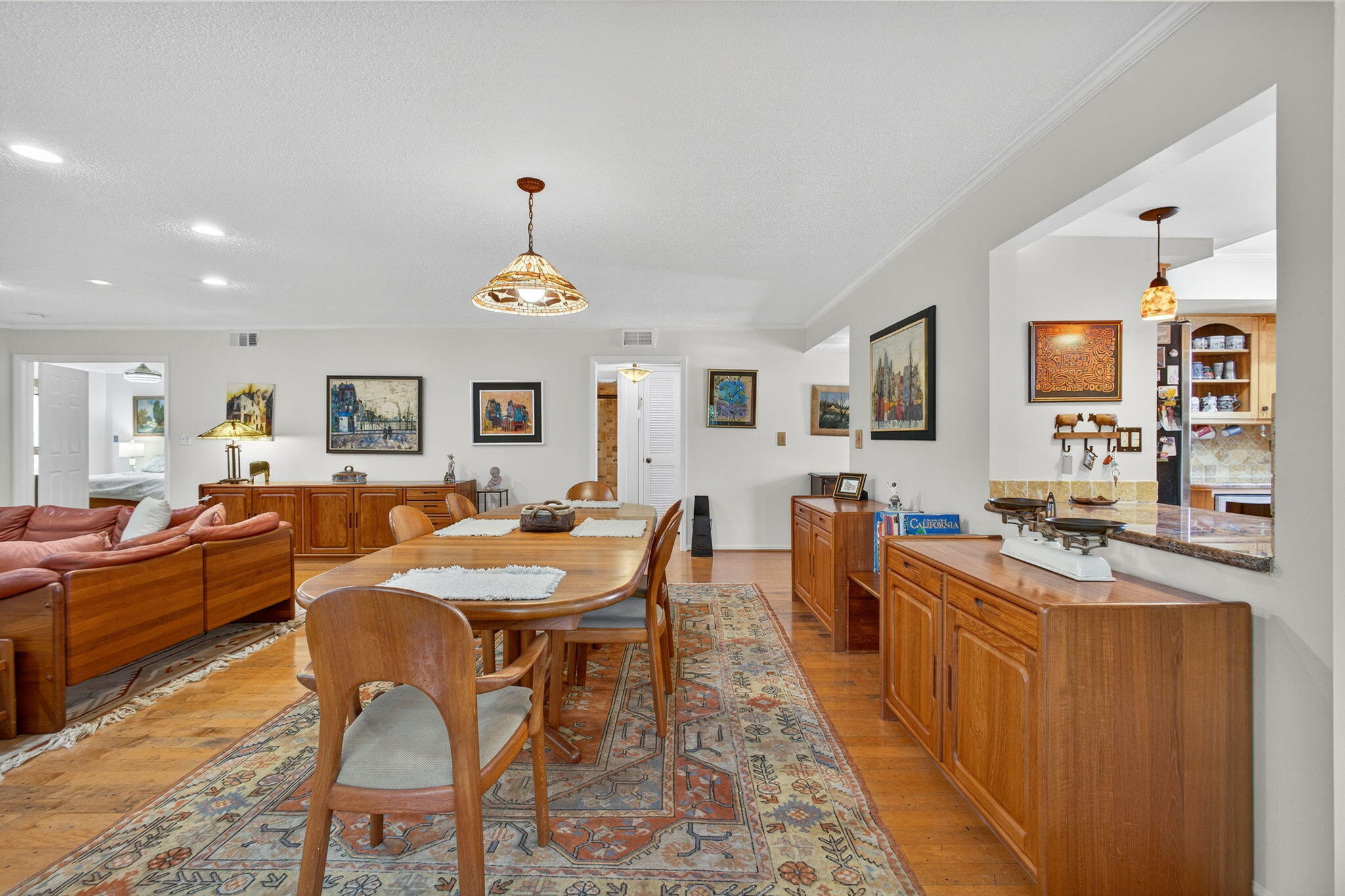 704 Clubhouse Circle Jupiter, FL 33477 - Photo 18 of 72 a view of a dining room with furniture window and wooden floor