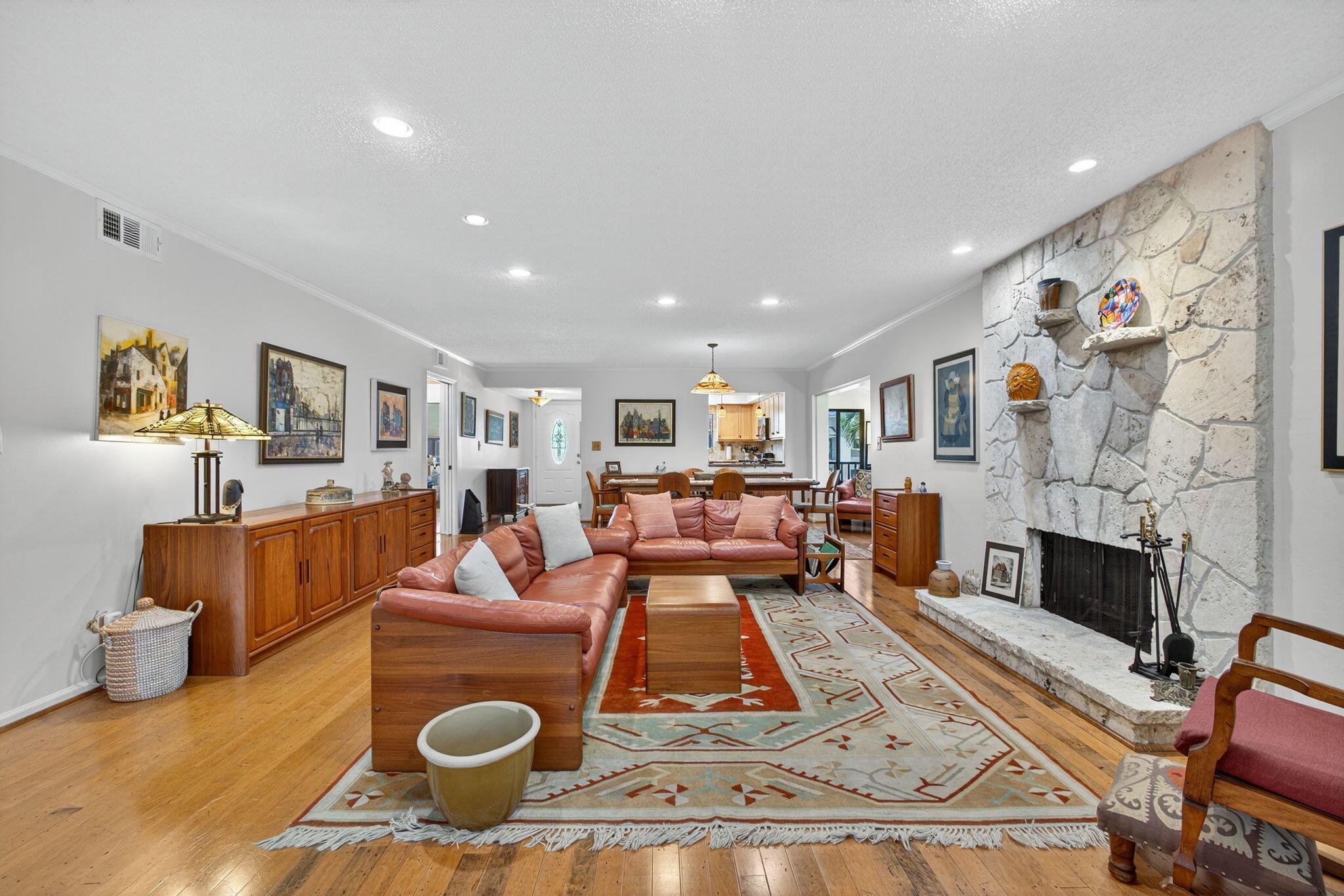 704 Clubhouse Circle Jupiter, FL 33477 - Photo 27 of 72 a living room with furniture and a fireplace