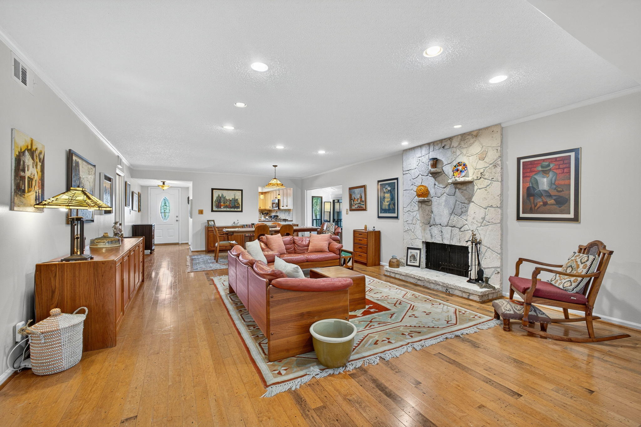 704 Clubhouse Circle Jupiter, FL 33477 - Photo 28 of 72 a living room with furniture and a fireplace