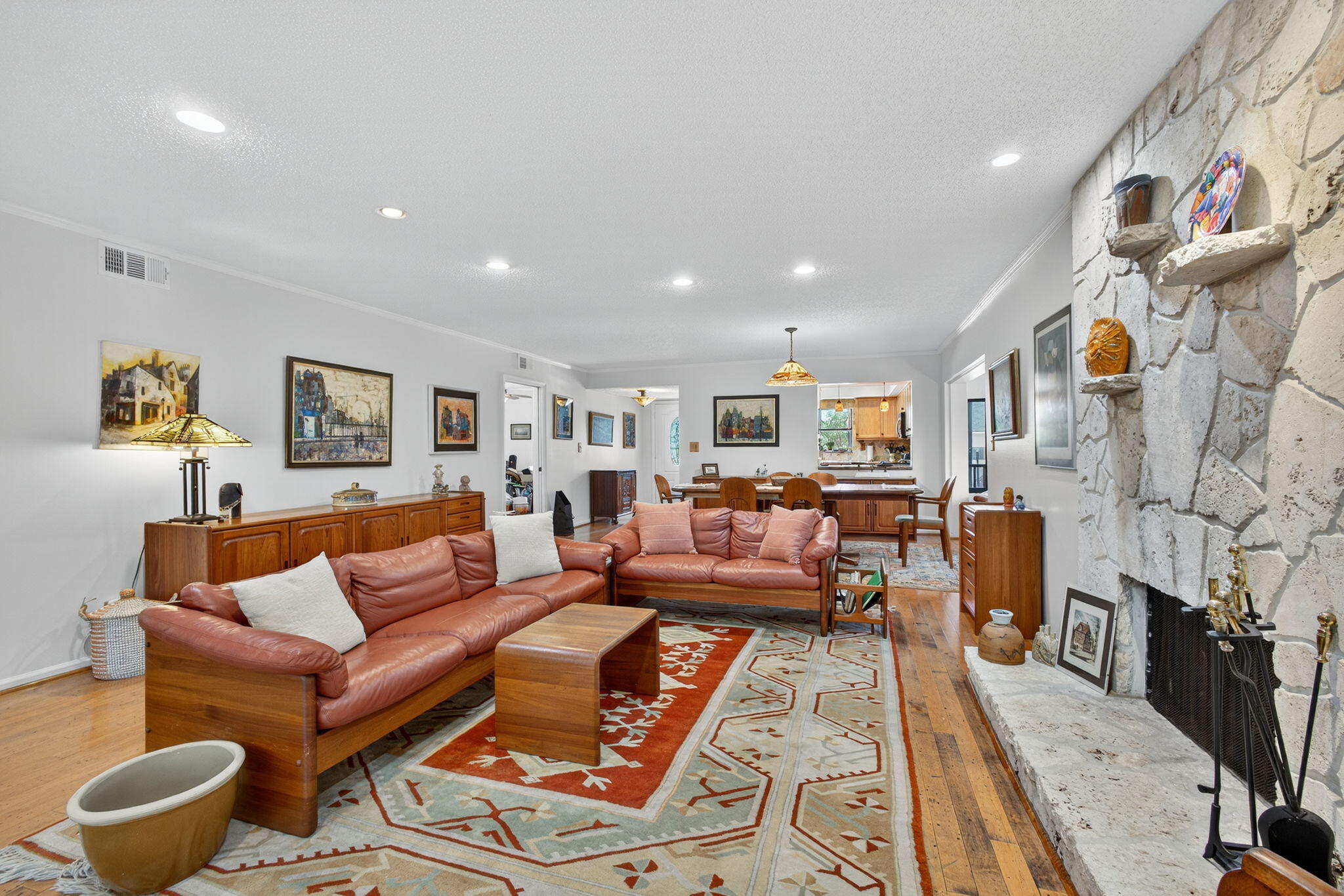 704 Clubhouse Circle Jupiter, FL 33477 - Photo 29 of 72 a living room with fireplace furniture and a flat screen tv