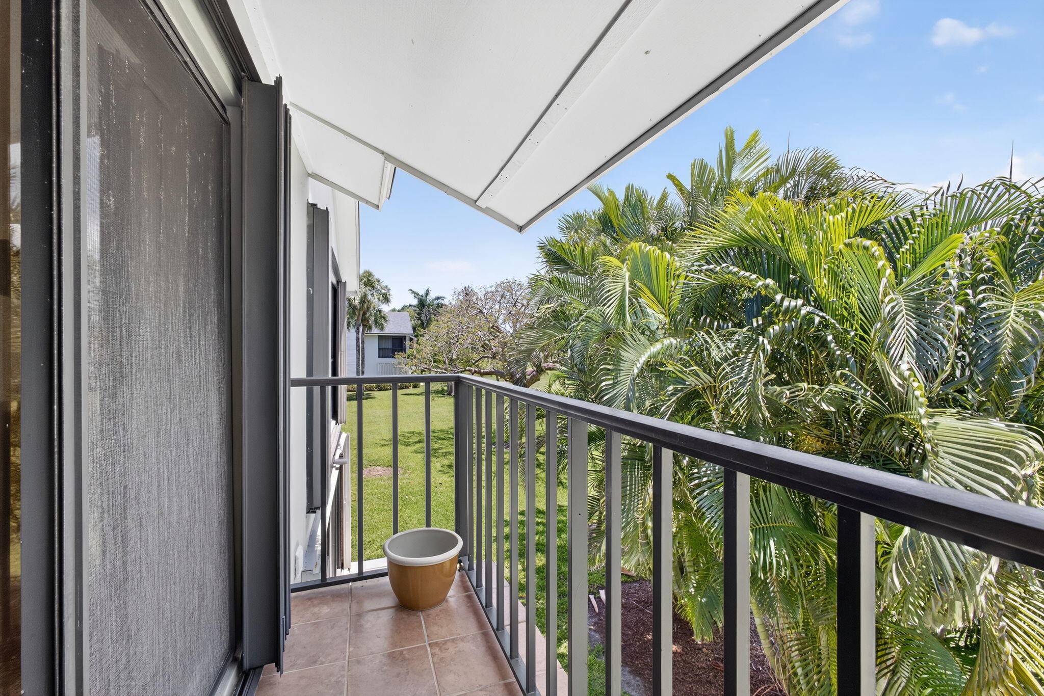 704 Clubhouse Circle Jupiter, FL 33477 - Photo 40 of 72 a view of a balcony with an outdoor space