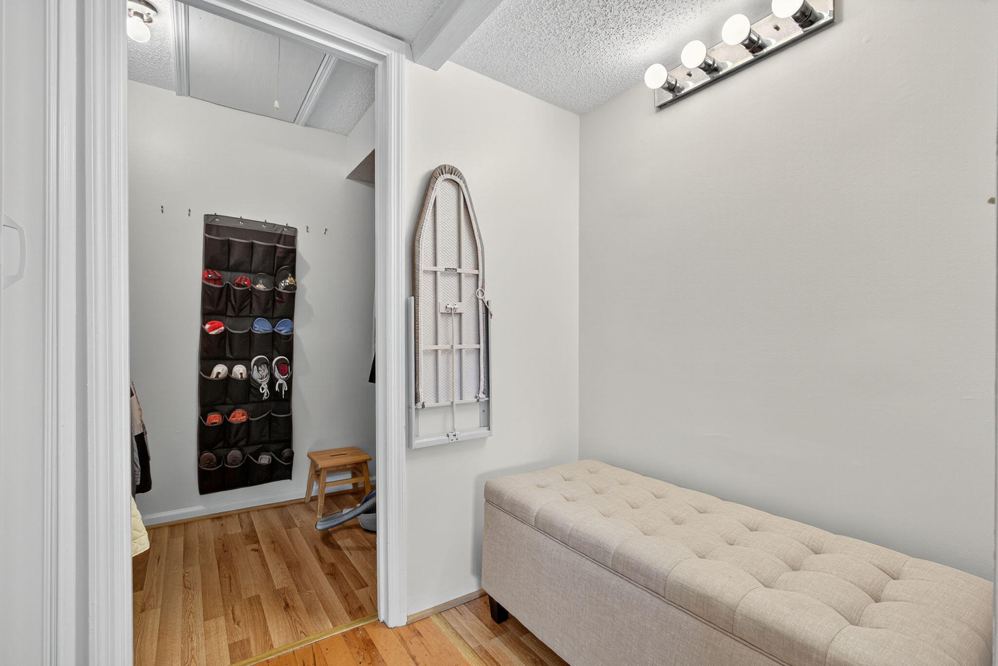 704 Clubhouse Circle Jupiter, FL 33477 - Photo 44 of 72 a view of walk in closet with clothes and shoes