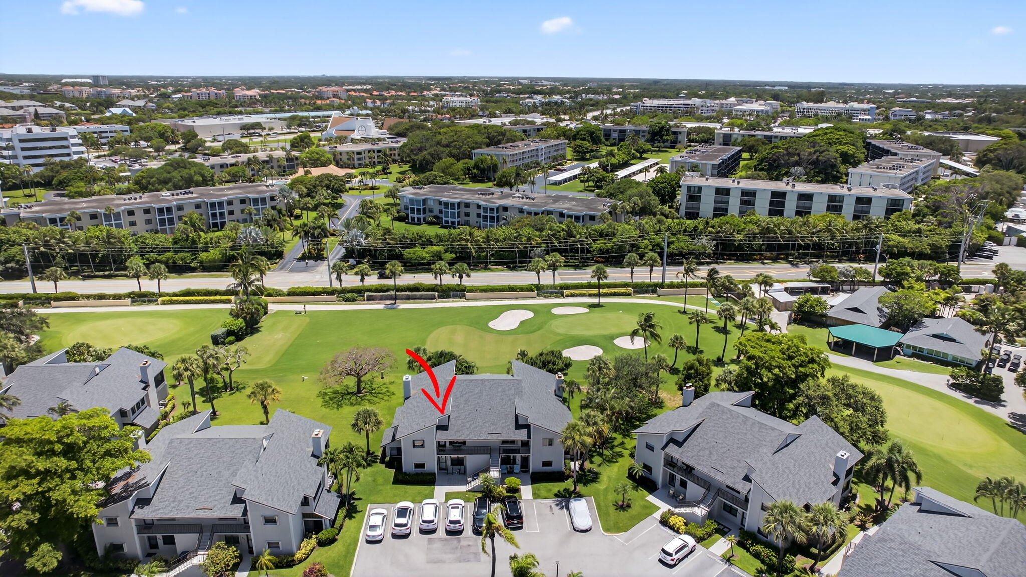 704 Clubhouse Circle Jupiter, FL 33477 - Photo 56 of 72 an aerial view of a houses with a swimming pool