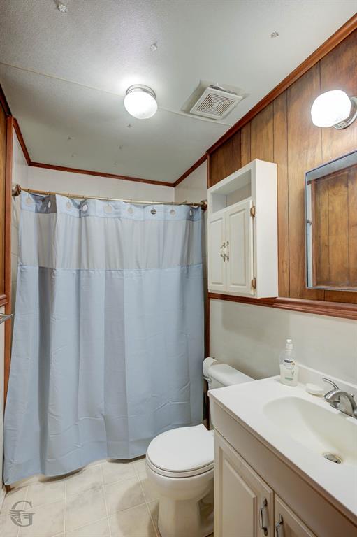 3721 Highway 155 Coushatta, LA 71019 - Photo 18 of 23 a bathroom with a sink a toilet and shower