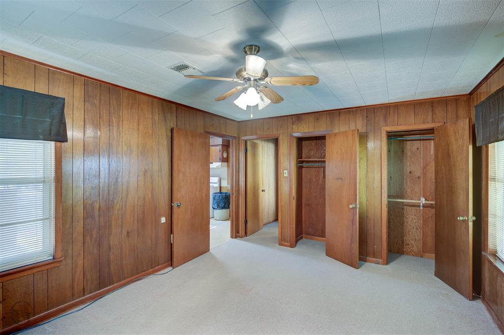 3721 Highway 155 Coushatta, LA 71019 - Photo 22 of 23 a view of a livingroom with a chandelier fan closet and a ceiling fan