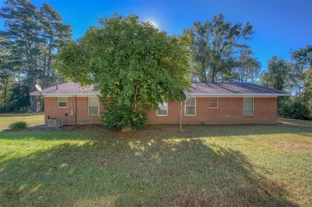 a house view with a outdoor space