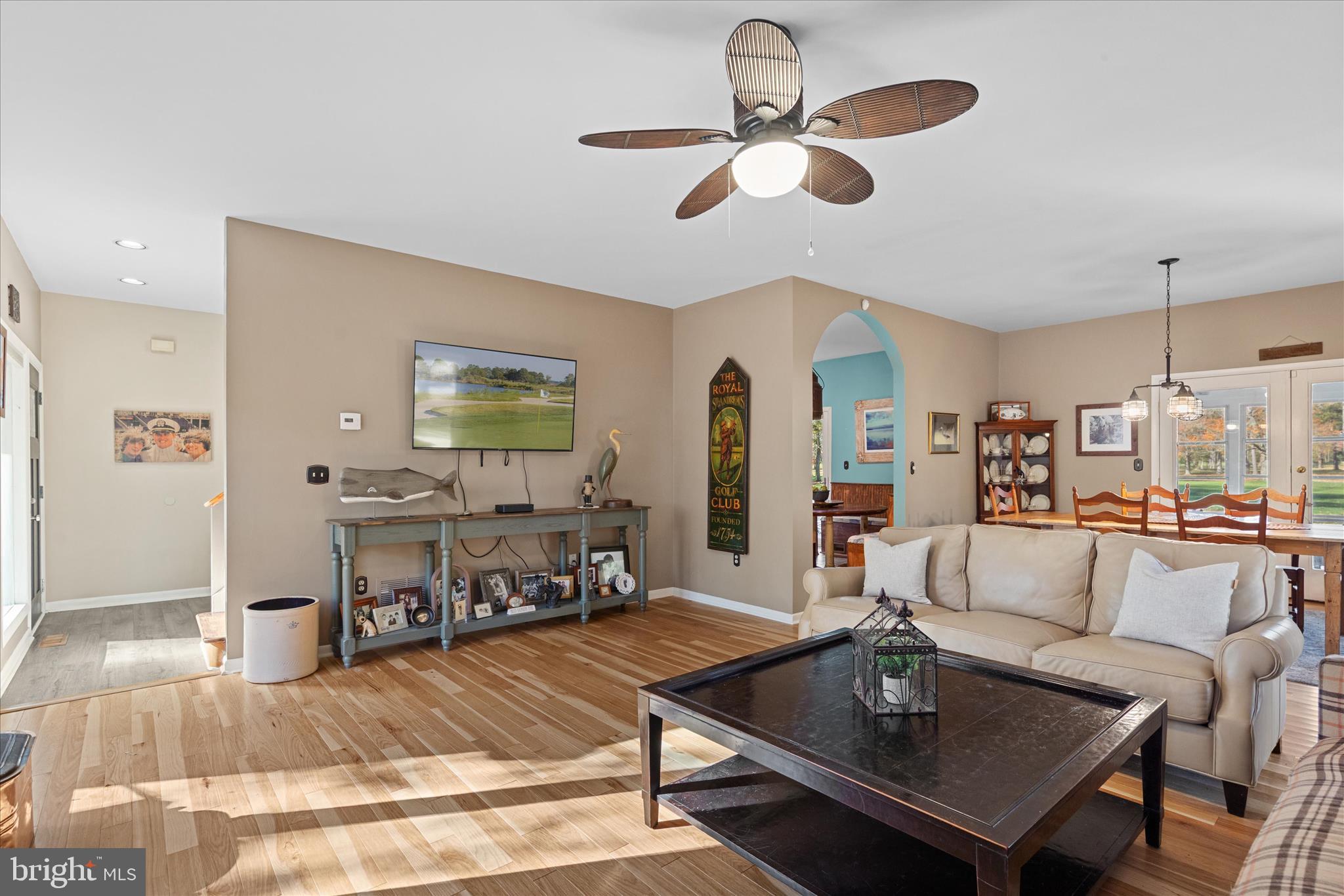 11518 Quillin Way Berlin, MD 21811 - Photo 22 of 65 a living room with furniture and a chandelier